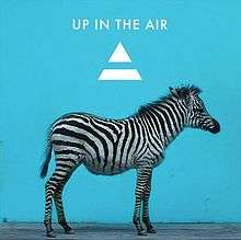 A zebra shown before a blue background, with the song's name and the band's logo shown above