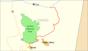 Map with Arches National Park in green, and various highways surrounding the park in blue and yellow.