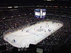 An interior view of the Verizon Center showing the ice, the stands, and the overhead video monitor