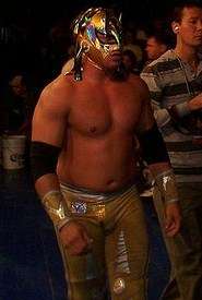 Volador Jr. walking to a wrestling ring at a live event