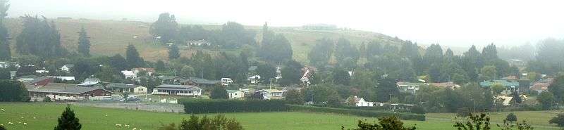 Panorama of Waikaia township on a foggy day, as viewed from the local cemetery.