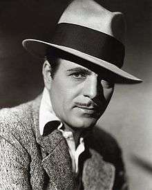 Warner Baxter in black and white promo photo