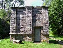 A small rectangular stone building