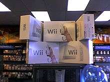 Stack of Wii display boxes in store