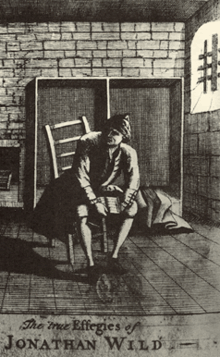  Jonathan Wild sits in Newgate Prison, with his account book on his knees.