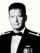 A black-and-white photo of an older white man in his military dress uniform