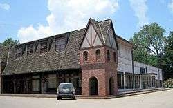 Downtown building in Wilson, Arkansas with Tudor-style architecture
