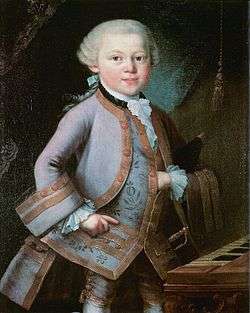  a child (Mozart) in formal embroidered 18th century costume, left hand thrust into his waistcoat. He looks directly out of the picture, although his body is turned towards the right.