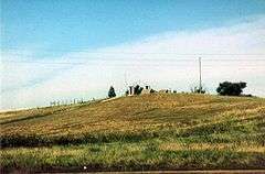 Photograph of a hill on the Wounded Knee battlefield.