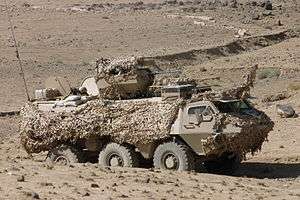 Estonian armored car in desert camouflage Afghanistan
