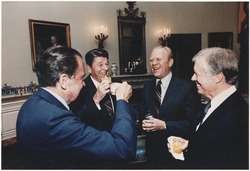 Photograph of four former U.S. Presidents, including Ronald Reagan, celebrating in a blue room before leaving for Egypt